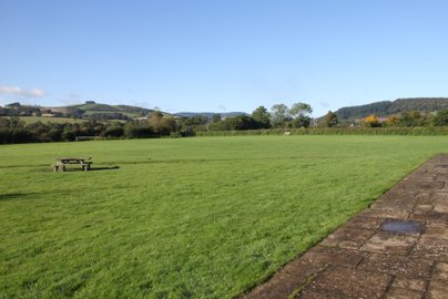 The Village Green at Aston on Clun and the famous "Blue Remembered Hills"